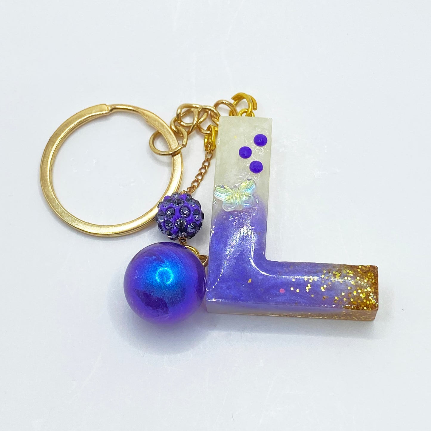 "L" Charms
